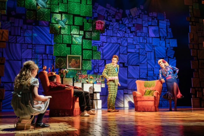 Matilda with Mr and Mrs Wormwood at home in Matilda the Musical at Bristol Hippodrome