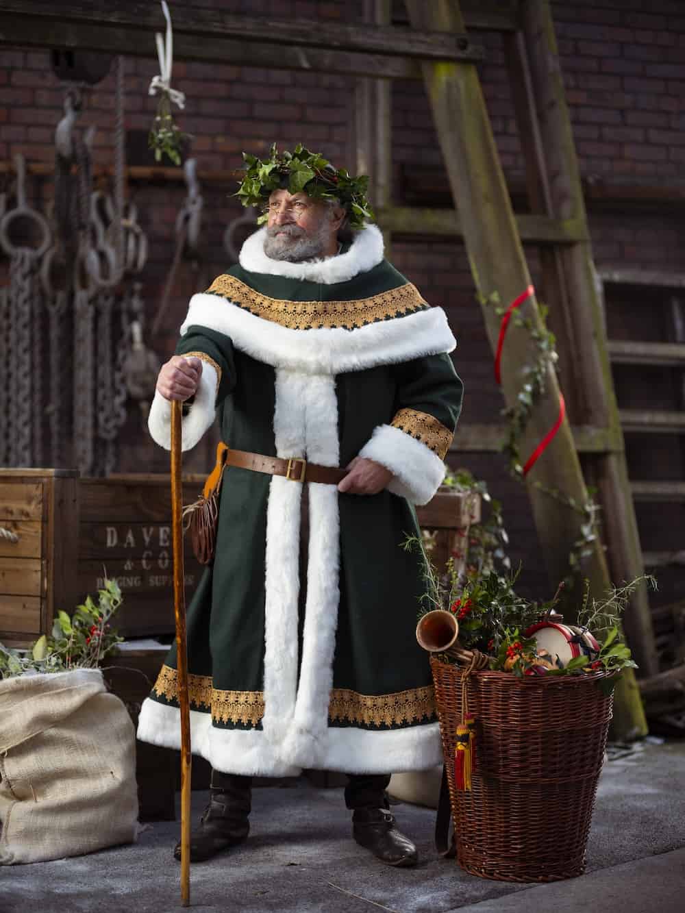 Old Father Christmas wearing green robes at the SS Great Britain dockyard